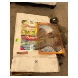 Golf clubs, pool recliner, puzzle, windshield