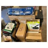 Empty power tool boxes, cutlery kits, air beds