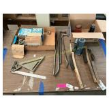 Brushes, jacks, pry bars, bolts