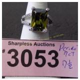 Simulated 7 ct peridot  ring   Size 7 ï¿½.