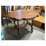 Vintage walnut table on wheels