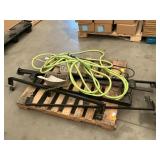 Bed frame, water hose, rake