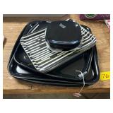 Stack of Black/Striped Plates + Trays