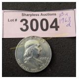 Uncirculated 1963 D Franklin silver half dollar