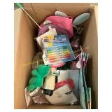Box of Easter decor, pencils