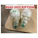 Plastic skulls w/ snowglobes