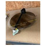 Lot of plates and grill cleaning brush