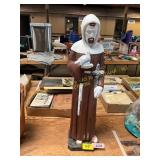 Concrete Friar Holding a Bird