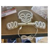 Neon skull sign