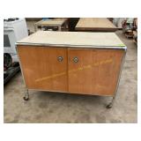 Metal/wood storage cabinet on wheels