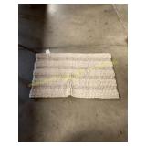 Tan bathroom floor mat