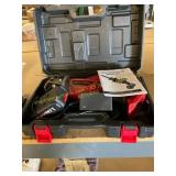 Assorted metal wreath frame and reciprocating saw