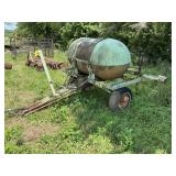 Pull behind sprayer with boom