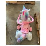 Kids riding unicorn