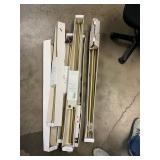 Pile of Curtain Rods Various Sizes