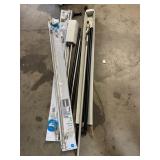 Pile of Curtain Rods Various Sizes