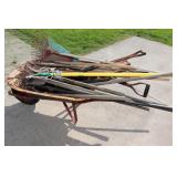 Wheelbarrow with Various Garden Tools