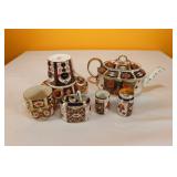 Royal Crown Derby Salt & Pepper,Tea Pot,Cup & Sau.