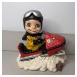 11" Vintage Ceramic Smiling Boy on Snow Mobil
