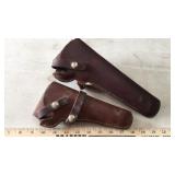 (2) LEATHER REVOLVER HOLSTERS