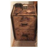 Wood two drawer file cabinet with alarm clocks
