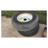 (2) EIGHT HOLE TRAILER RIMS & TIRES