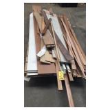 Assorted trim pieces, shelf board and wood pieces