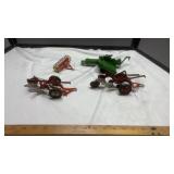 (4)  METAL IMPLEMENTS, TWO BOTTOM PLOWS, RAKE &