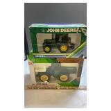 ERTL J.D. BATTERY OPERATED TRACTOR SCALE 1/32