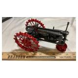 FARMALL F-12  TRAC TOR ON STEEL