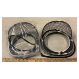 1957 CHEVY HEADLIGHT BEZELS (NEW)