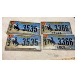 (12) WYOMING LICENSE PLATES
