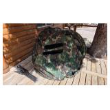 Camouflage tent with chair and circular hammock