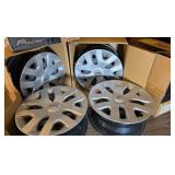 Set of 4 NIB 16x7.5 rims and hub caps pacer nissan