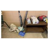 ASSORTED SMALL VACUUMS AND TABLE