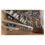 Assorted 1/4, 3/8, and 1/2" sockets