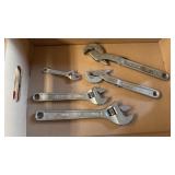 Adjustable wrenches