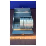 Blue film canister & toilet paper holder