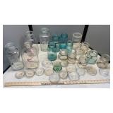 ASSORTED GLASS BOTTLES, JARS AND LIDS