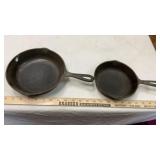 (2) CAST IRON PANS N0. 5 & 6-1/2"