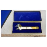 HELIX GOLD WRENCH & ASSORTED LICENSE PLATES