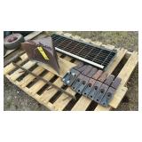 METAL WHEEL CHOCK, GRATE, & BUCKET TEETH