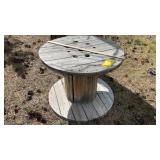 ROUND WOOD SPOOL MEASURES 36' W X 27' T