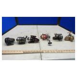 (6) FISHING REELS & GUN RACK