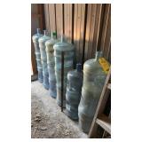 (17) WATER JUGS W/ BOTTOMS CUT FOR TOMATO PLANTS
