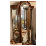 LIGHTED ARCHED CURIO CABINET WITH CURVED GLASS