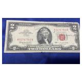 1963 A TWO DOLLAR SILVER CERTIFICATE RED SEAL