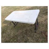 4' Lifetime plastic folding table.