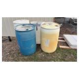 Five 55 gal Plastic Storage Drums.