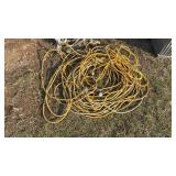 2 Extension Cords, approx 100 ft. One has